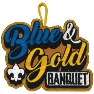 The Blue & Gold Banquet BSA patch features an embroidered yellow loop, "Blue & Gold Banquet" in blue, gold, white, and black text, plus a white fleur-de-lis on a brown background.