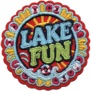 The Lake Swimming Patch features bold "LAKE FUN" lettering, colorful embroidery of sun rays, waves, and a scalloped floral border.