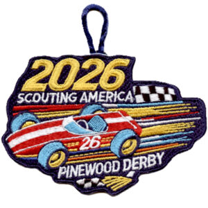 The 2026 Pinewood Derby Patch features a red-striped race car with the number 26, checkered flags, bold "2026 Scouting America Pinewood Derby" text, and a blue hanging loop.