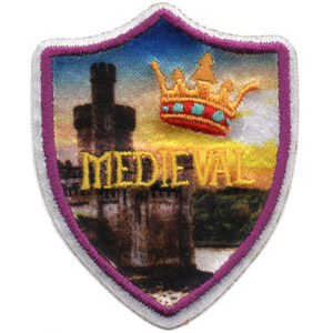The Medieval Patch (Copy) is shield-shaped, featuring a castle, golden crown, and "MEDIEVAL" in yellow letters. It has a purple border and a scenic background with blue sky and greenery.