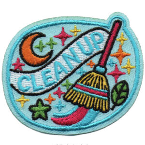 The Clean Up Patch (Copy) features a broom, colorful stars, a crescent moon, leaves, and "CLEANUP" embroidered on a light blue background.