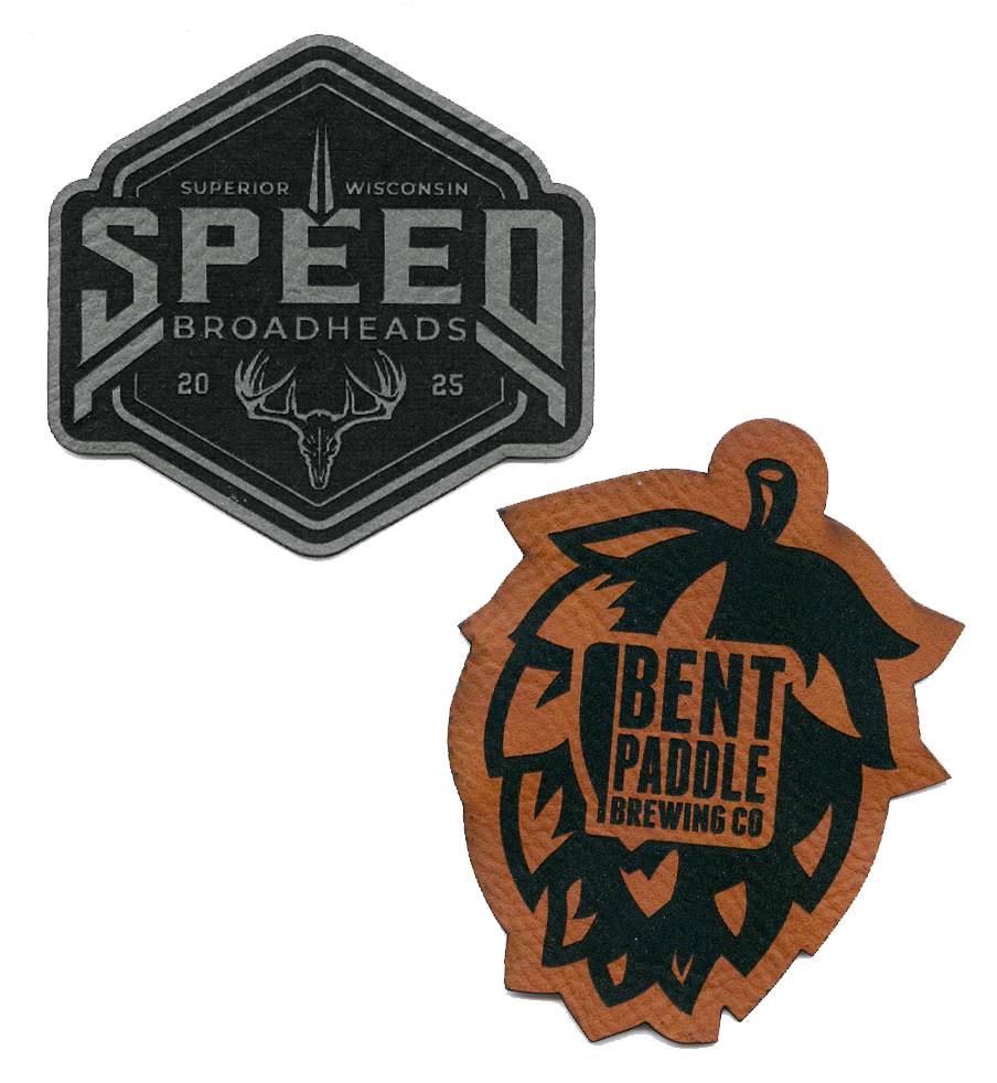 Two brewery logo stickers: one is a black hexagon with a deer skull and "Speed Broadheads" text; the other is a brown hop-shaped sticker with "Bent Paddle Brewing Co" and a paddle graphic.