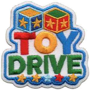 The Toy Drive Patch (Copy) is a colorful embroidered patch featuring toy blocks, stars, and bold "TOY DRIVE" lettering—perfect for promoting a toy donation event or campaign.