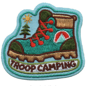 The Troop Camping Patch features a hiking boot with red laces, a pine tree, and sun on a light blue background, with "TROOP CAMPING" embroidered at the bottom.