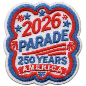 The "250 Years America" embroidered patch features scalloped edges, red and blue text reading "2026 Parade 250 Years America," stars, red fireworks, and decorative borders.
