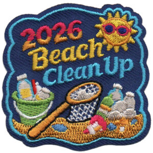 The Beach Clean Up Patch features a smiling sun in sunglasses, “2026 Beach Clean Up” text, and images of a net, basket, and collected trash on sand with a blue border.