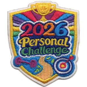 The Challenge Your Limits Patch (Copy) is a vibrant shield-shaped embroidered badge featuring "2026 Personal Challenge" in bold, with a trophy, weights, path, and target on a colorful background.