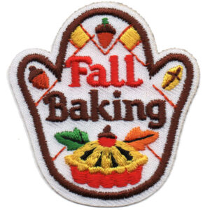 The Holiday Baking Patch (Copy) is an oven mitt-shaped embroidered patch featuring "Fall Baking," autumn leaves, a pie, acorns, and baking utensils in orange, yellow, green, brown, and red thread.