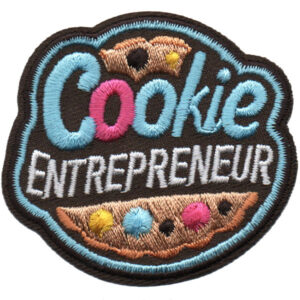 The Cookie Entrepreneur Patch (Copy) features "Cookie Entrepreneur" in blue and white, plus two cookies with colorful chocolate chips.
