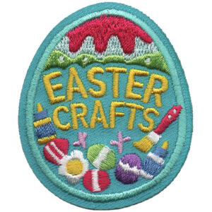 The Easter Patch (Copy) is an embroidered patch shaped like an Easter egg, featuring decorated eggs, paintbrushes, and "Easter Crafts" in yellow on a blue background.