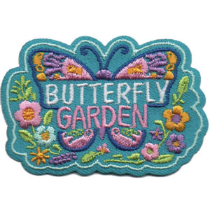 The Botanical Garden Patch features a colorful butterfly and floral embroidery with “BUTTERFLY GARDEN” in bold white and pink letters across the center, finished with a blue scalloped border.