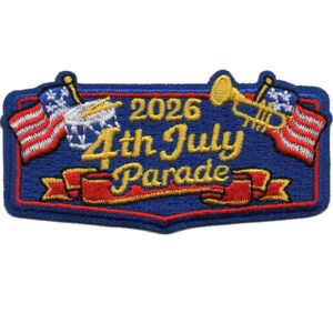 The 2026 4th of July Parade Patch features yellow “2026 4th July Parade” text, American flags, a drum, and a trumpet on a blue background with a red ribbon design.