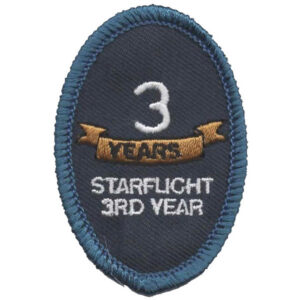 The National Art Experience (Copy) features an embroidered oval patch with a blue border, a large white "3," a gold "YEARS" banner, and the words "STARFLIGHT 3RD YEAR" below.