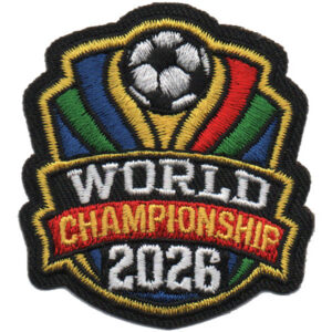The 2026 World Championship Patch features an embroidered soccer ball on top, blue, red, and green stripes, and "WORLD CHAMPIONSHIP 2026" in bold white and red lettering.